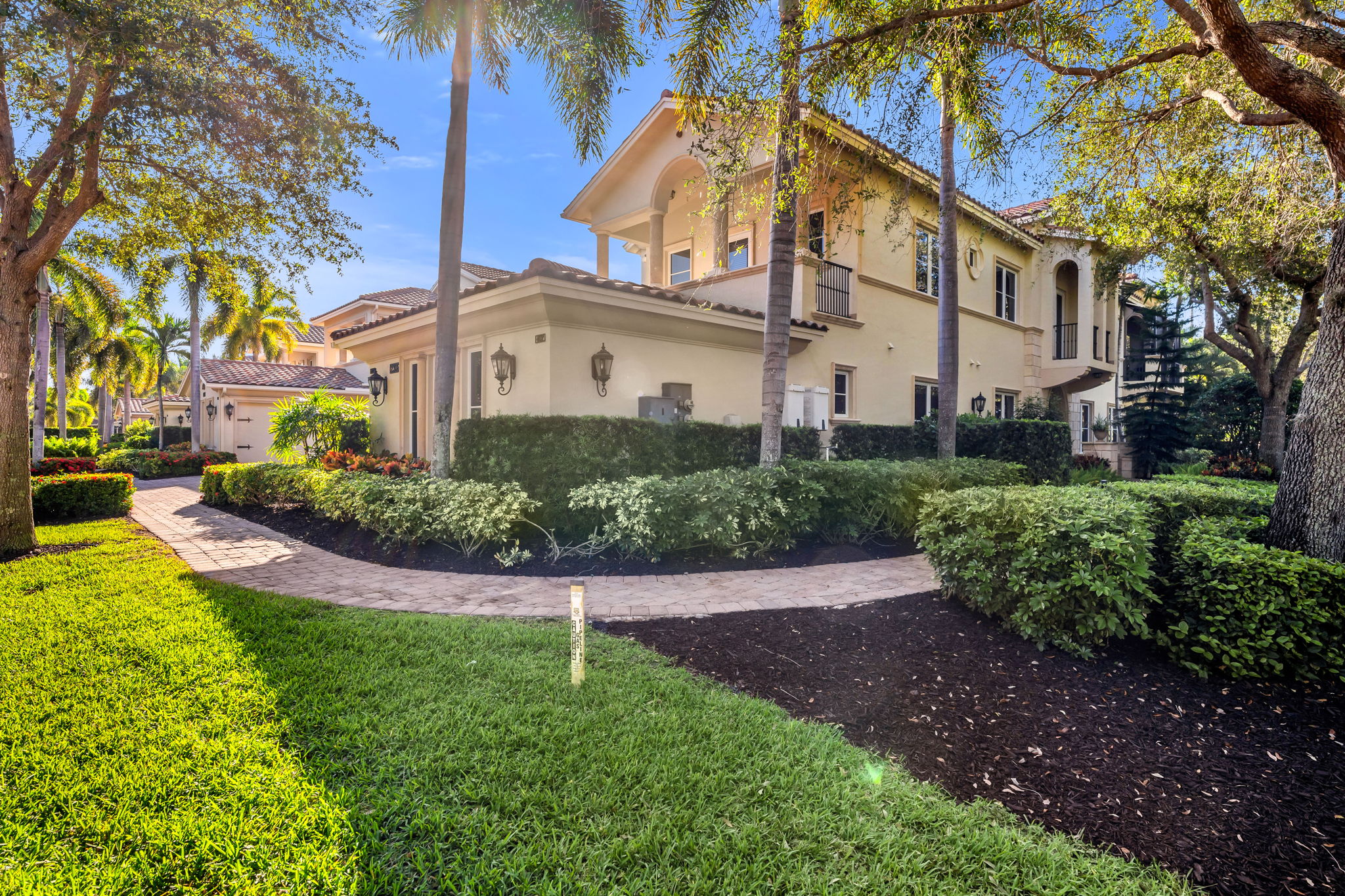 Front of residence during the day (street view).