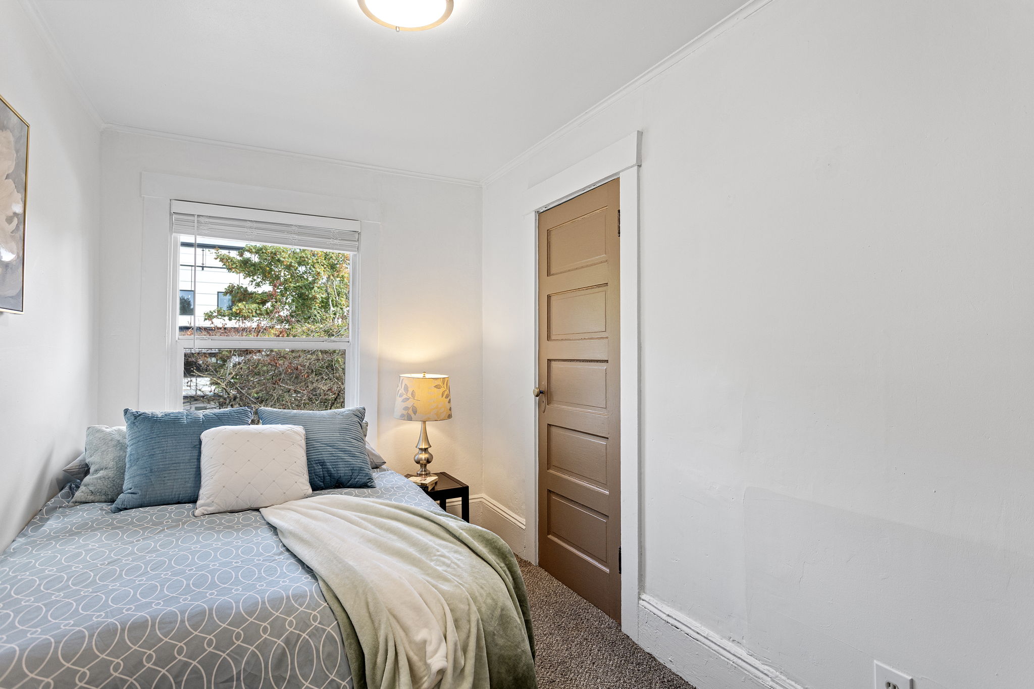 The second bedroom faces north toward E Columbia and includes a walk-in closet.