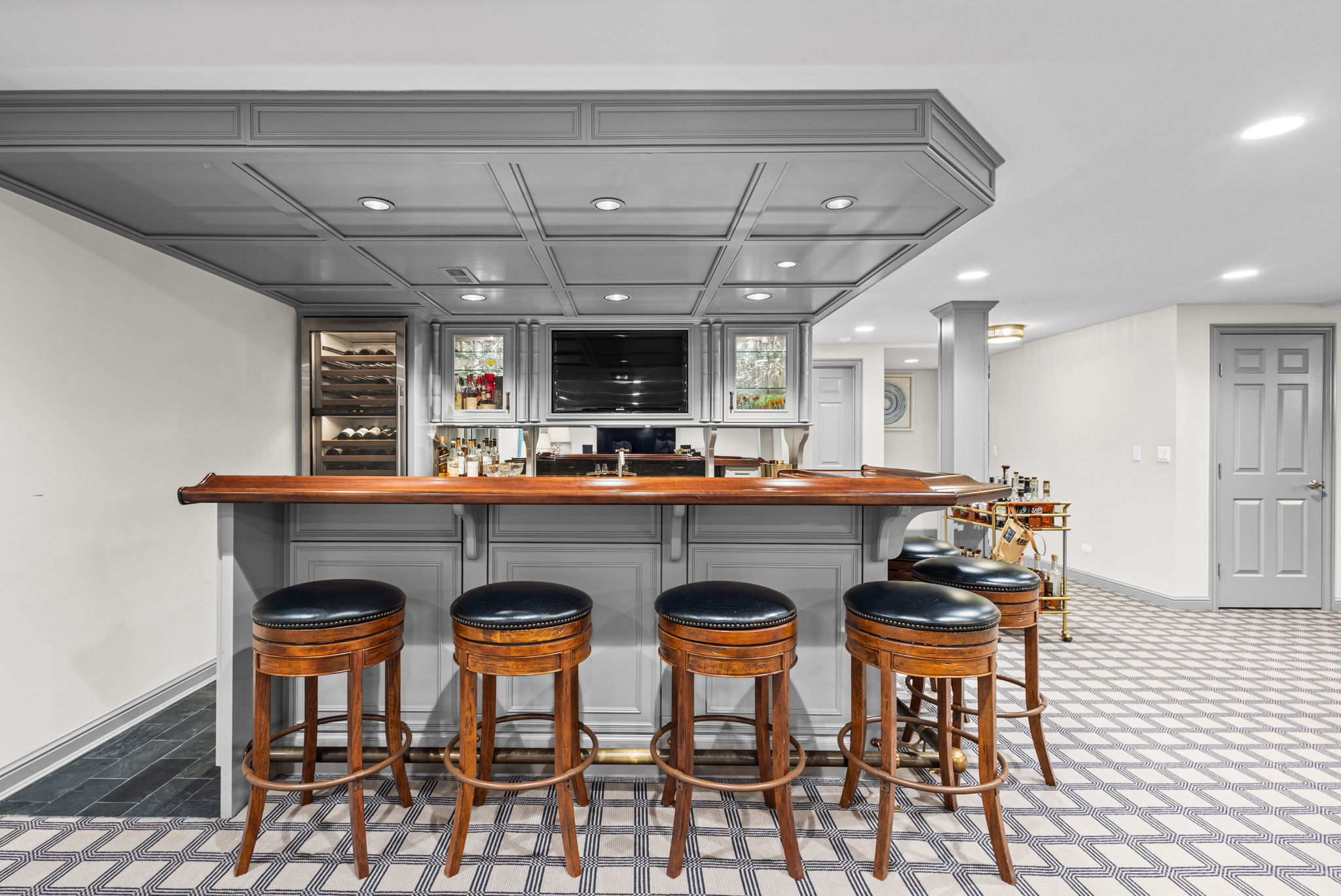 High-end custom bar with wine fridge