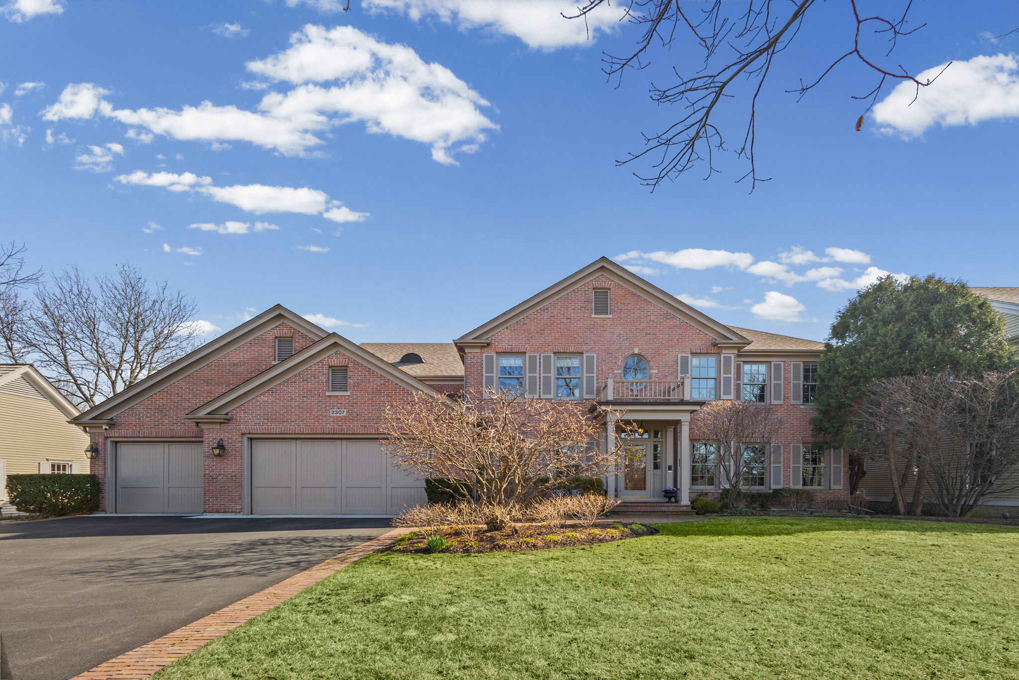 Exterior with spacious 3 car garage