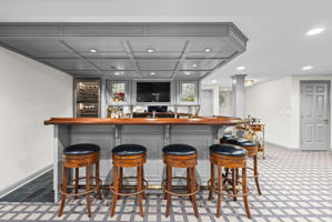 High-end custom bar with wine fridge