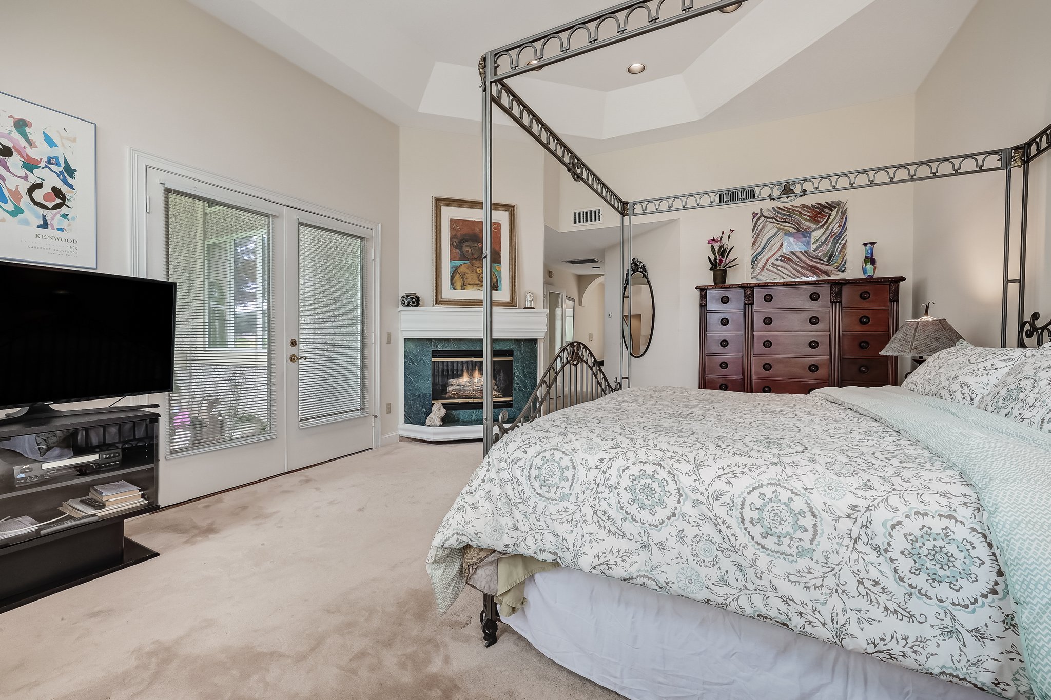 Master Suite  with fireplace, opens to Patio