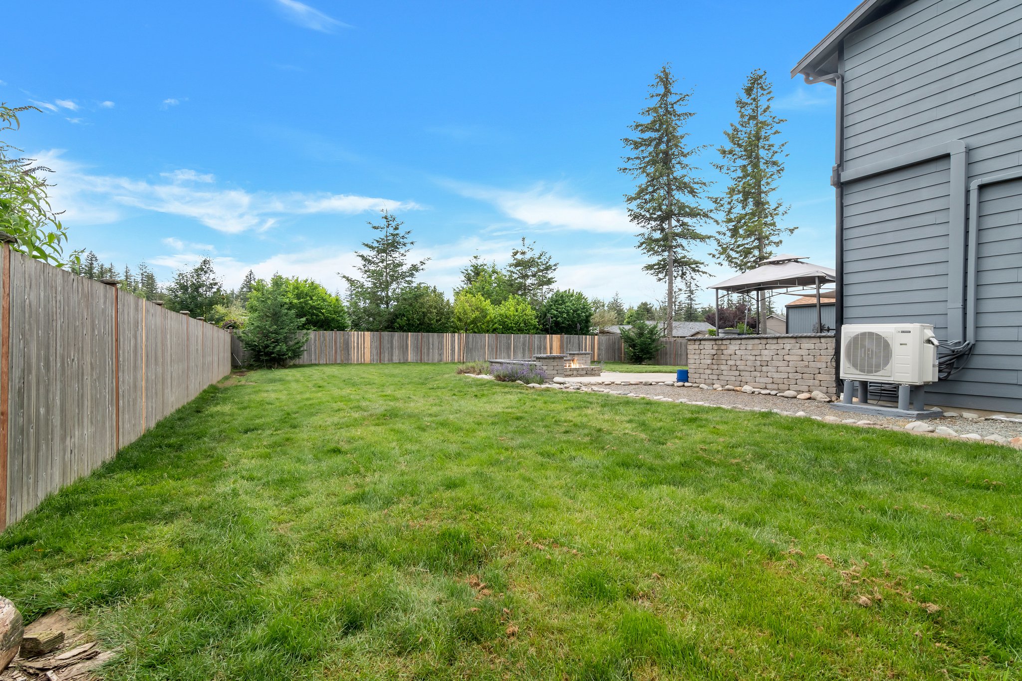 Fantastic side yard w/firewood storage