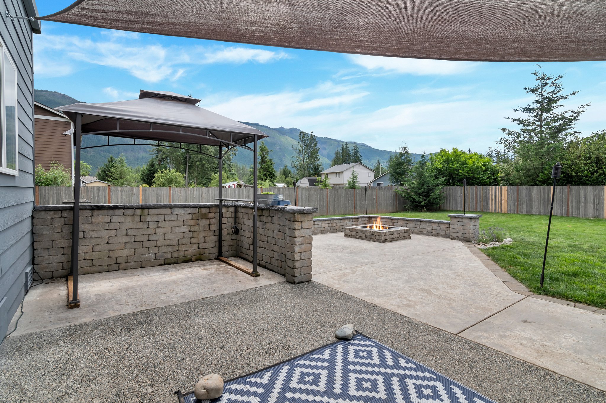 Enjoy grilling under the pergola