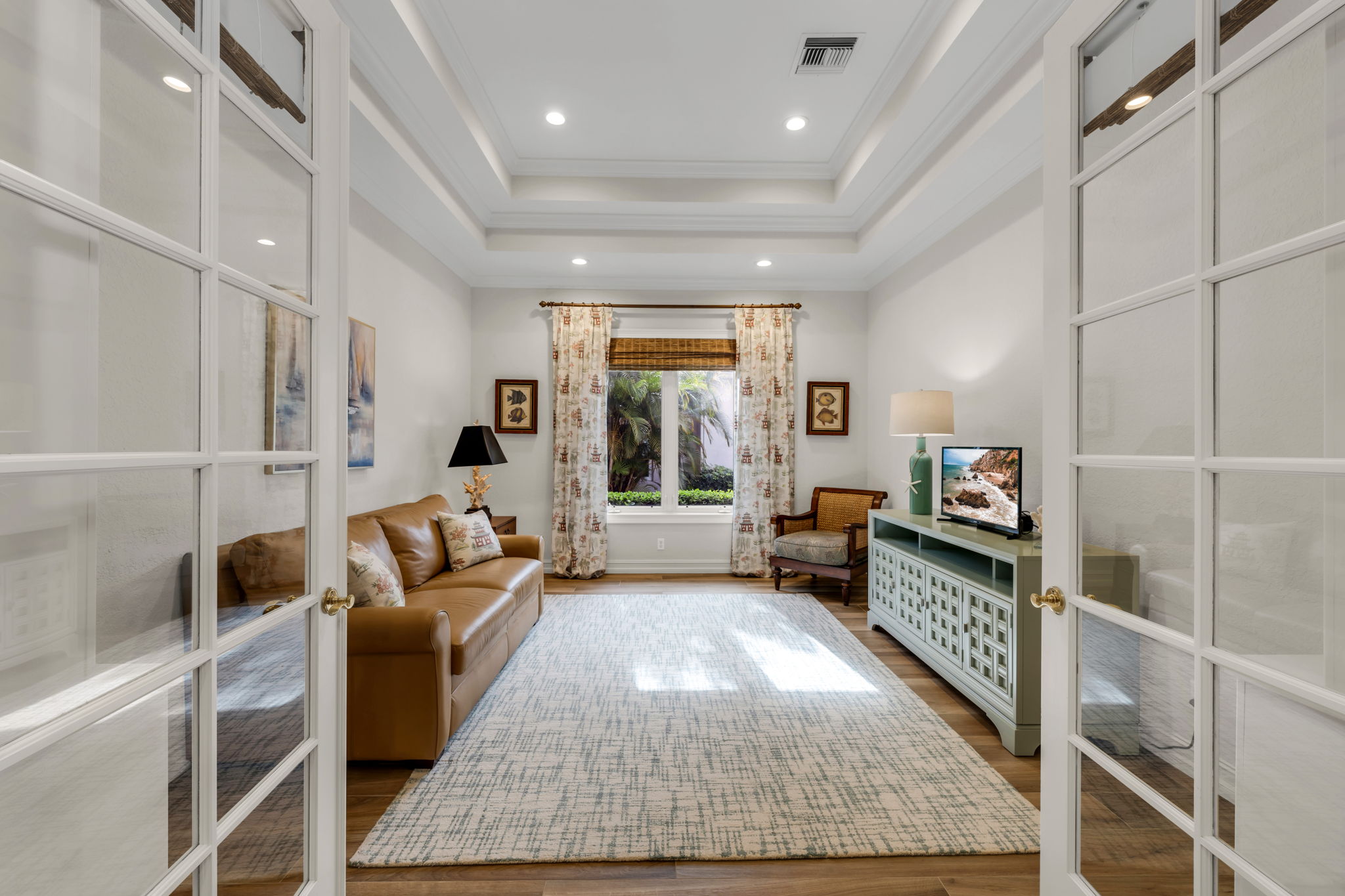 The den, located directly across from the formal dining room, has plenty of space to be converted into an office or a 4th bedroom.