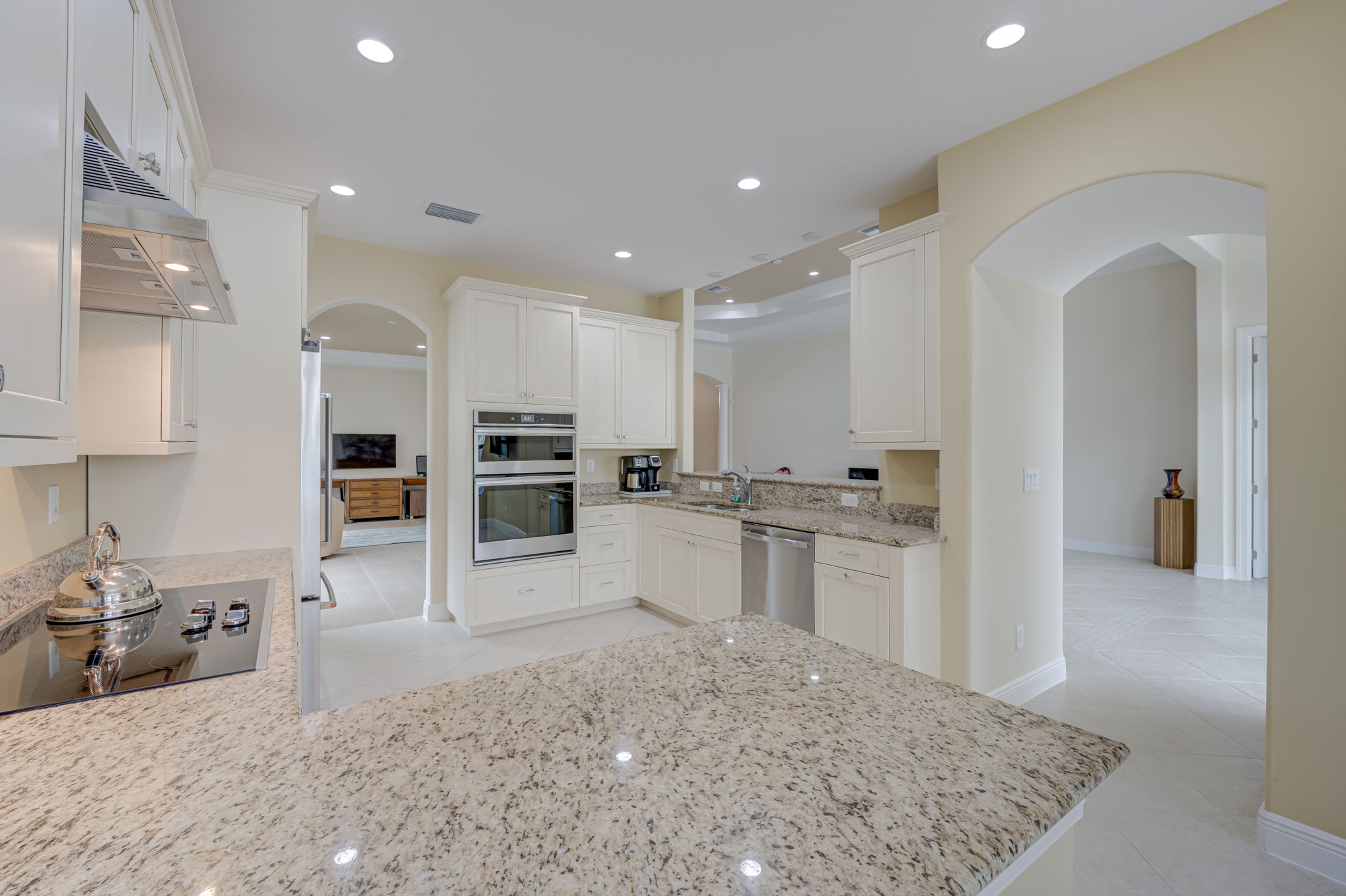 Gourmet Kitchen with Abundant Cabinetry & Granite Counters