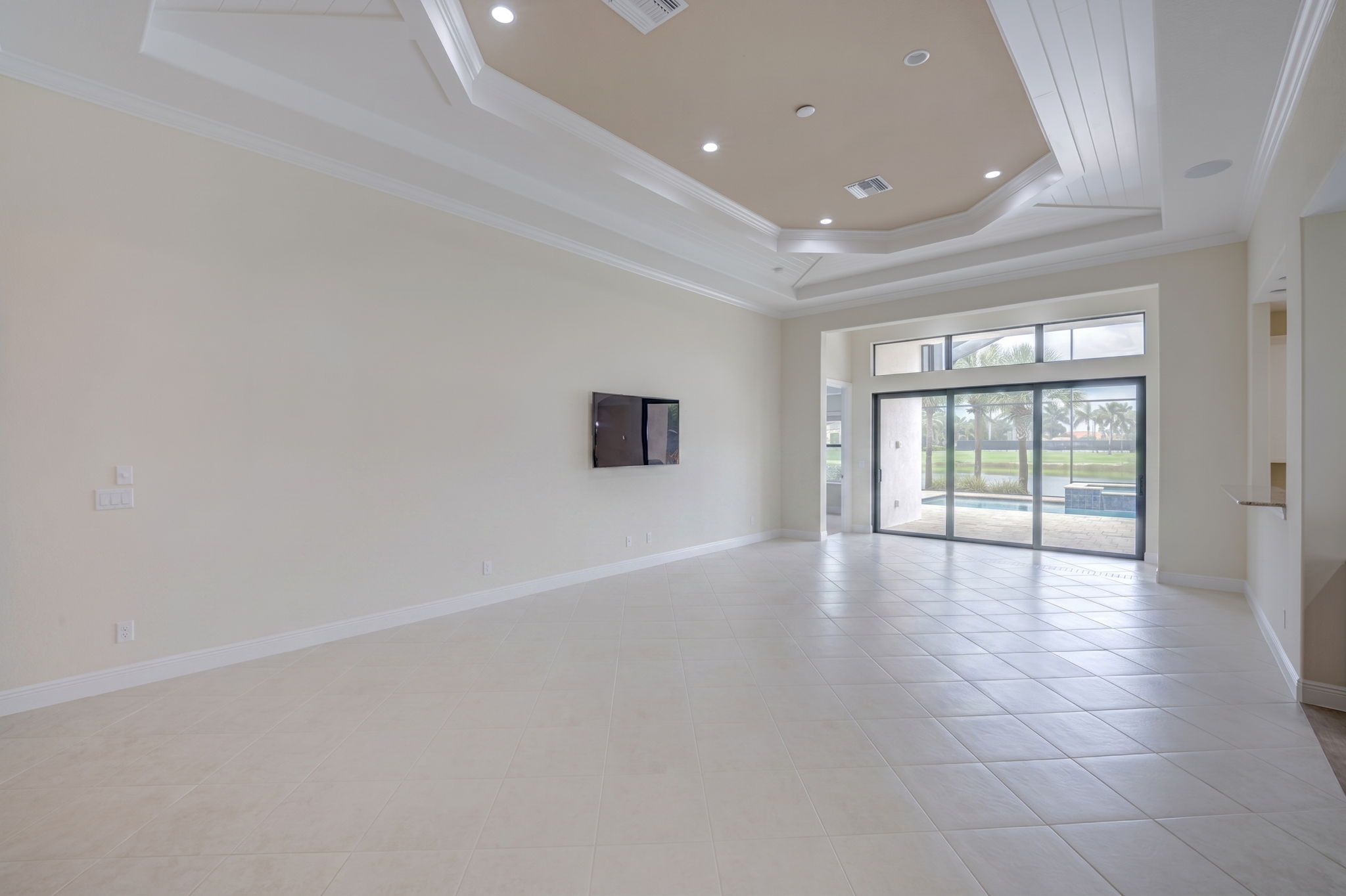 Expansive Great Room with Custom Tray Ceilings