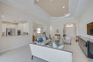 Spacious Gathering Space Connecting Living, Dining & Kitchen Areas