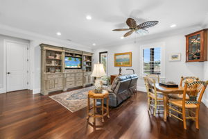 The 2nd-floor loft/den has a French door that opens to a balcony and a great second family room for guests upstairs.