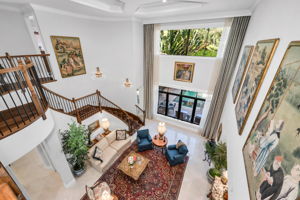 The formal living room has automated sun shades.