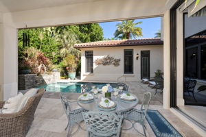 The lanai has automated screens that come down and plenty of space for entertaining.