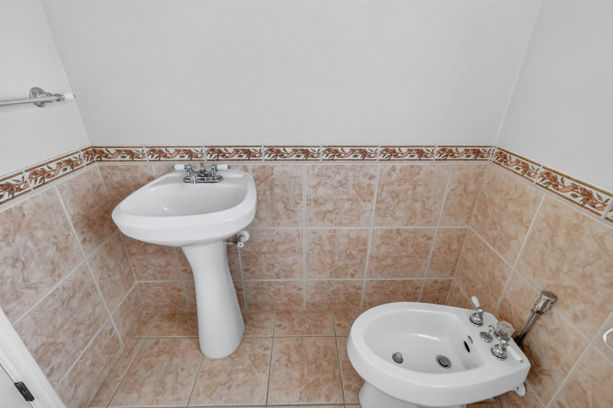 Primary Bathroom Private Water Closet, Bidet, and Sink