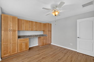 Second Bedroom with Custom Desk and Cabinetry