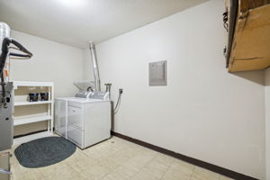 Wonderful separate laundry/closet area for overflow storage