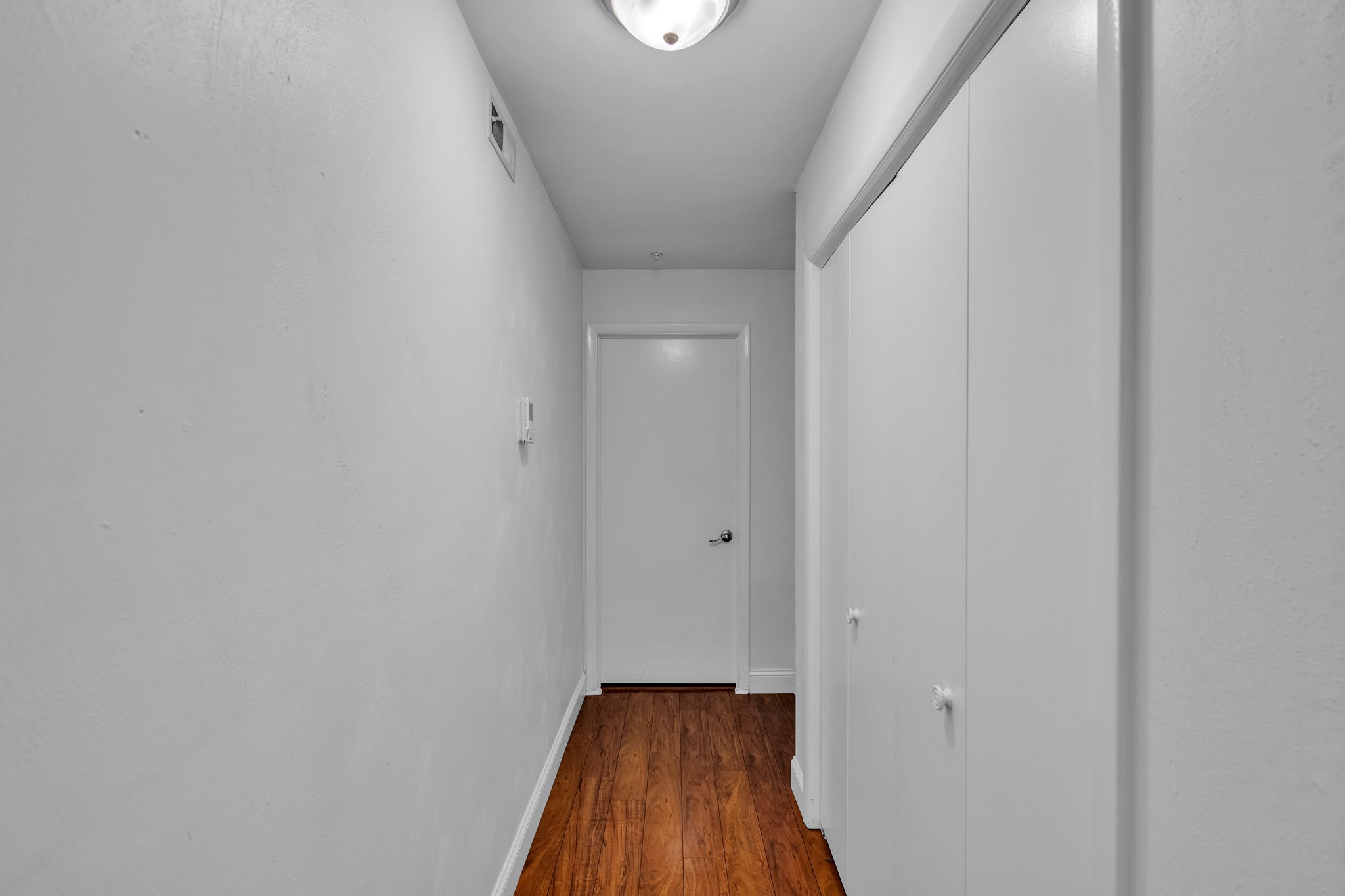 Hallway to Utility Room & 3rf Floor Stairs