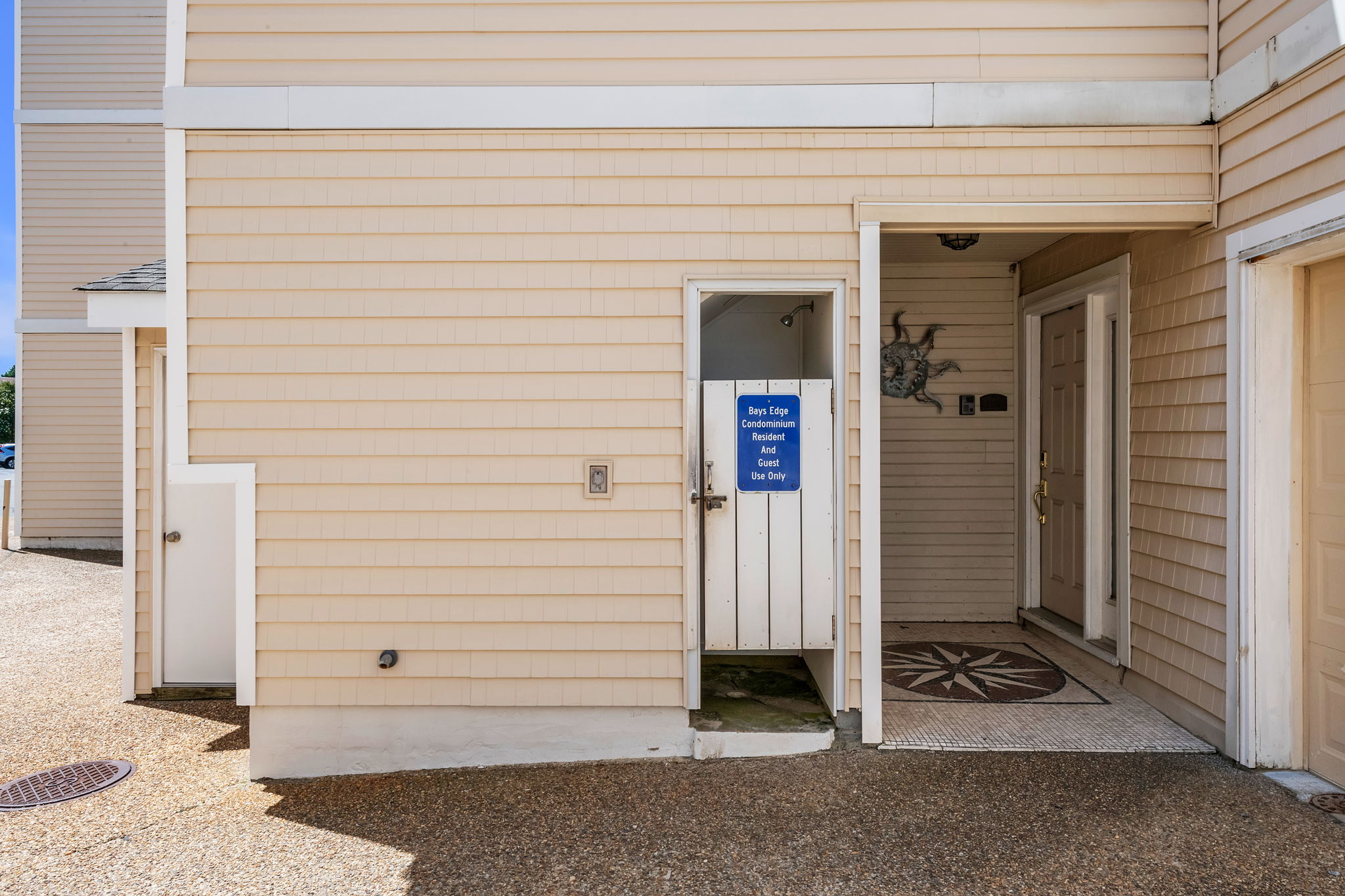 Private community bay access w/ deck, shower, and walkway