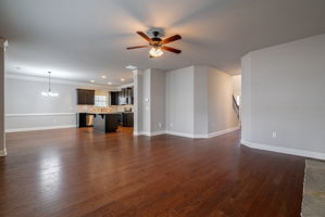 Great room that opens into the dining & kitchen