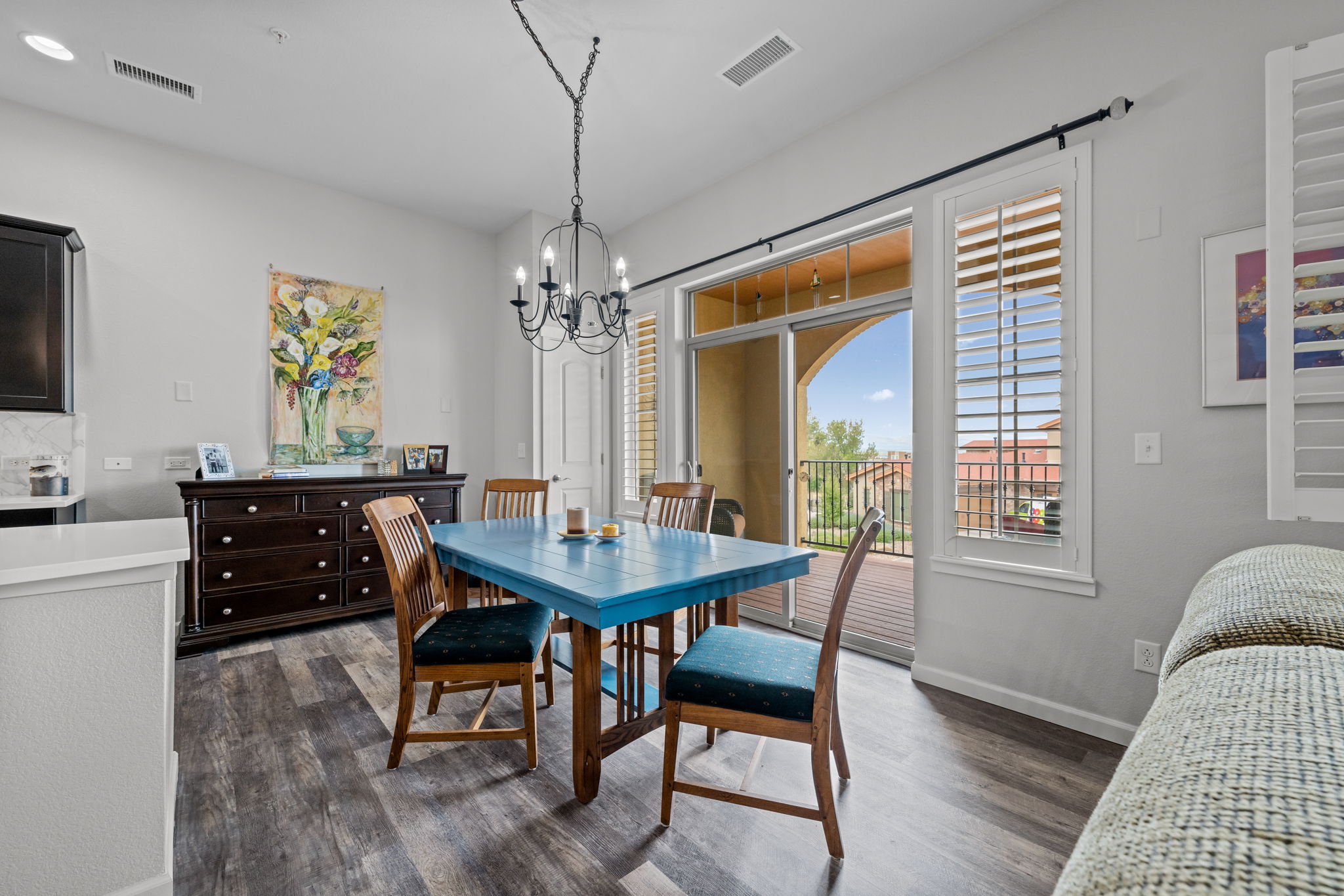 Dining Room with custom plantation shutters, great views to balcony