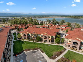 Aerial View of the building, reservoir and mountains