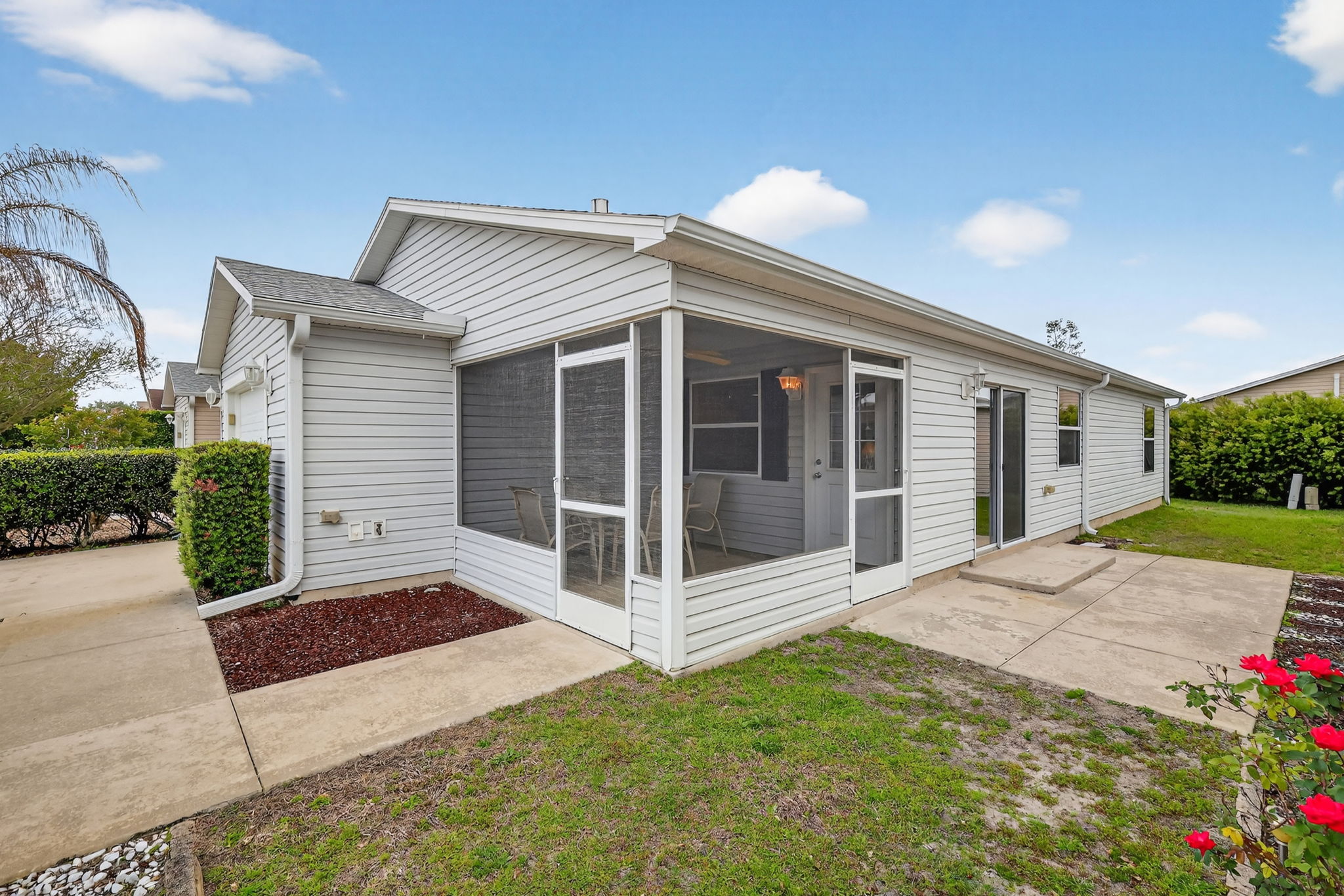Front and Side Elevation with Lanai and Side Patio