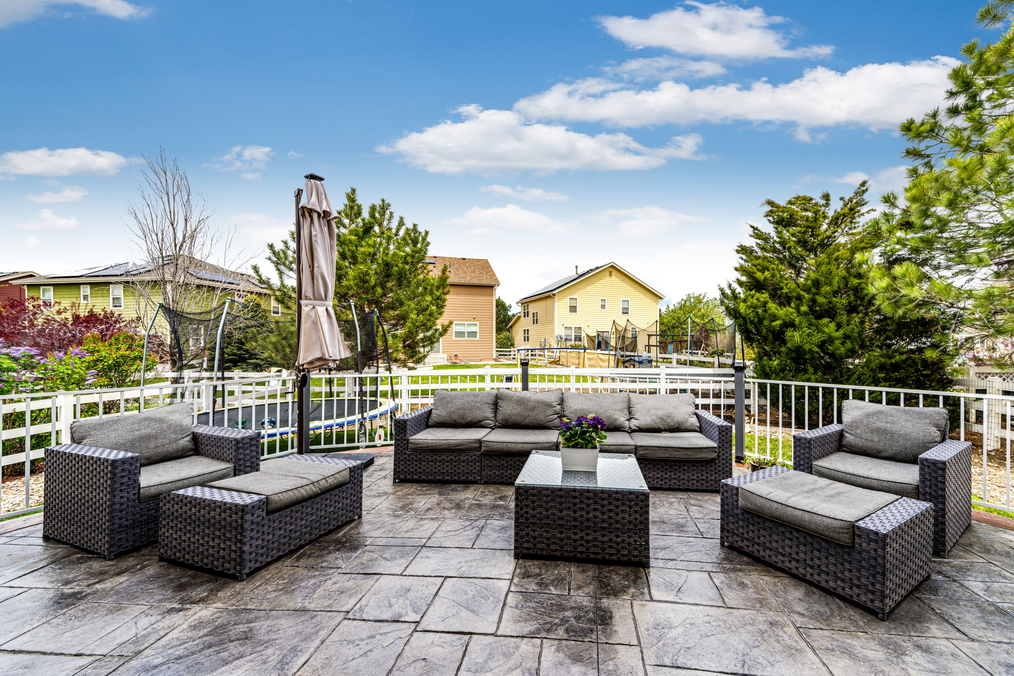 Enjoy relaxing on your stamped concrete backyard patio area