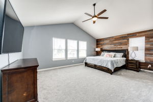 Large Primary bedroom with vaulted ceiling