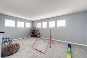 Loft area currently being used as a kiddos gymnastics training center!