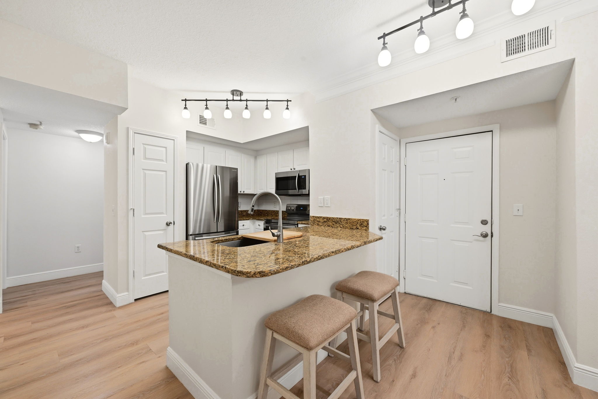 Fully Equipped Kitchen with Stainless Steel Appliances