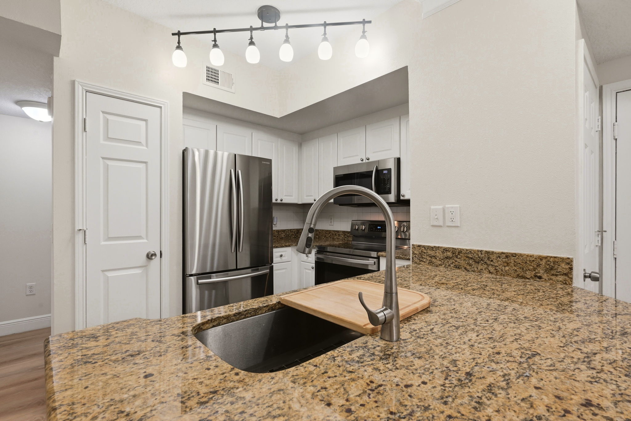 Fully Equipped Kitchen with Stainless Steel Appliances