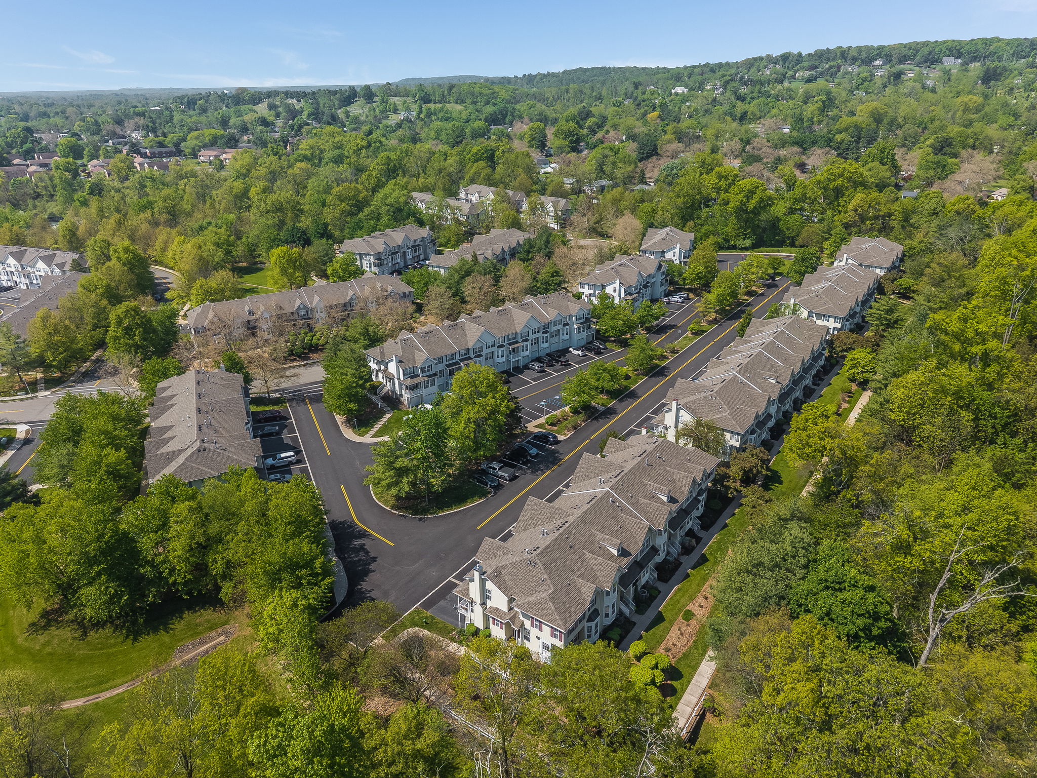 Prime location and natural wooded setting in the highly sought-after Townsende community, this Ascot model end-unit town-house offers 1,959 SF of beautifully maintained living space.