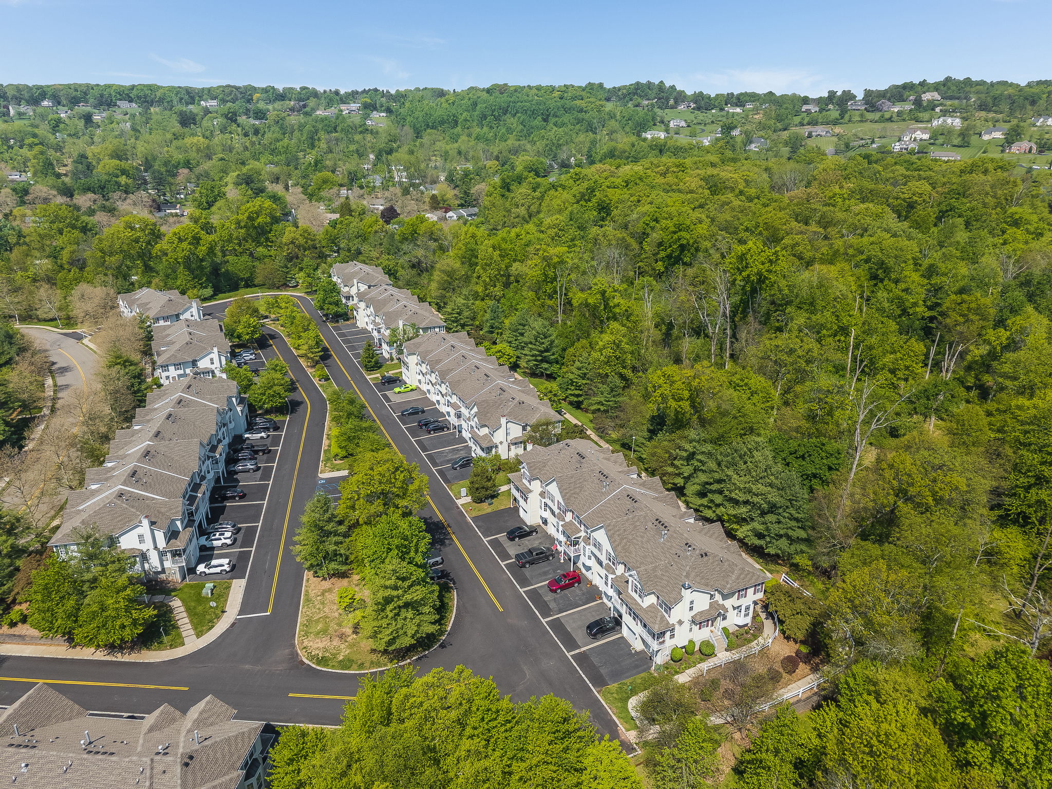 Prime location and natural wooded setting in the highly sought-after Townsende community, this Ascot model end-unit town-house offers 1,959 SF of beautifully maintained living space.