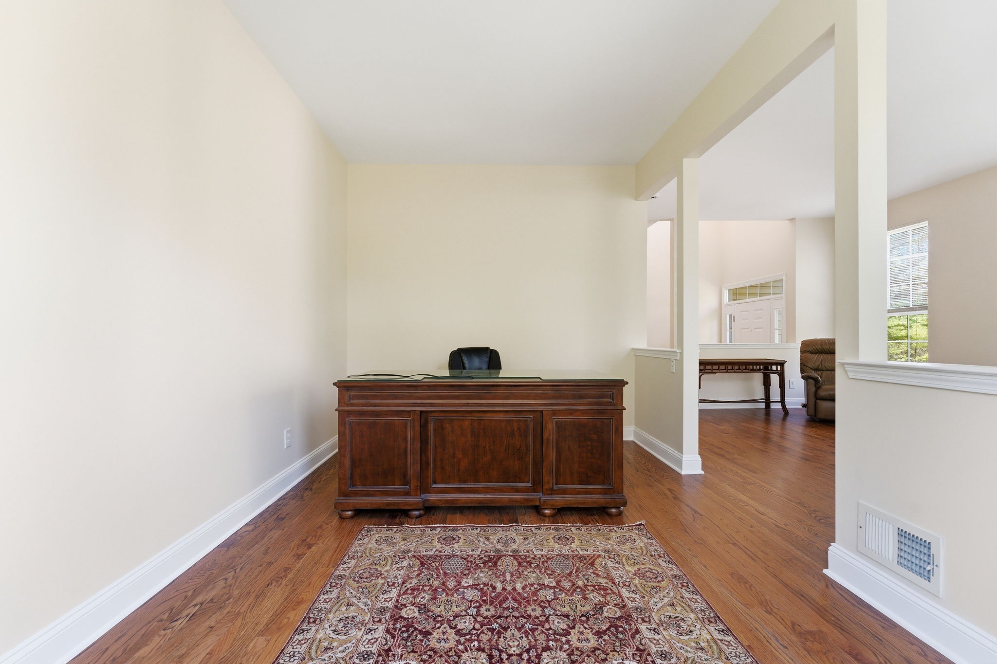 Bay window and refinished hardwood floor. Refinished hardwood floors throughout the main level.