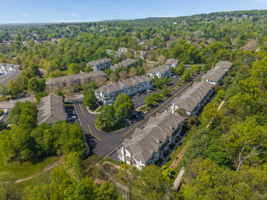 Prime location and natural wooded setting in the highly sought-after Townsende community, this Ascot model end-unit town-house offers 1,959 SF of beautifully maintained living space.