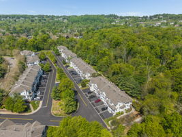 Prime location and natural wooded setting in the highly sought-after Townsende community, this Ascot model end-unit town-house offers 1,959 SF of beautifully maintained living space.