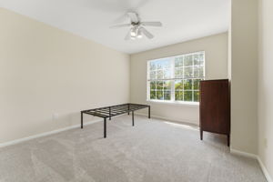 Ceiling fan, double slider closet, newer wall-to-wall carpet.