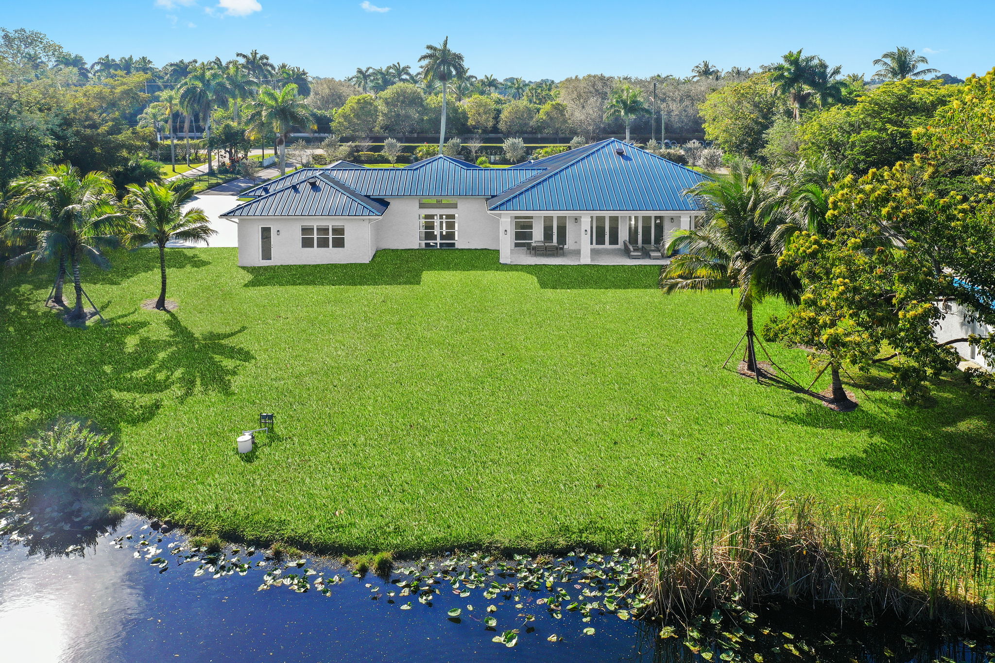Aerial View - Expansive Green Space Lakefront