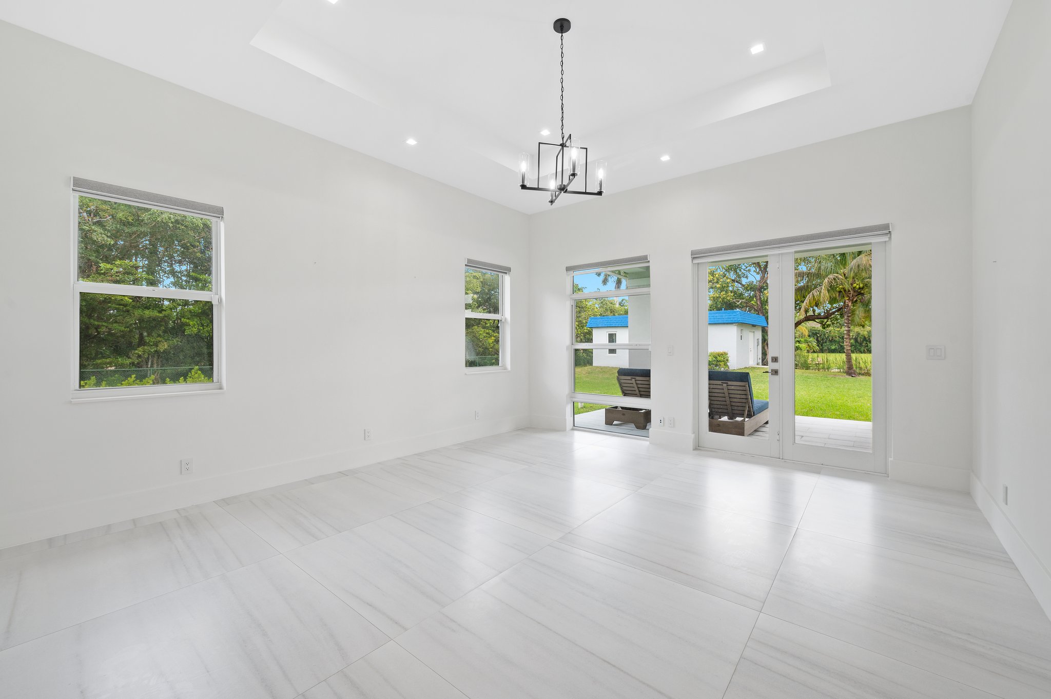 Primary Bedroom opens to the outdoor living area