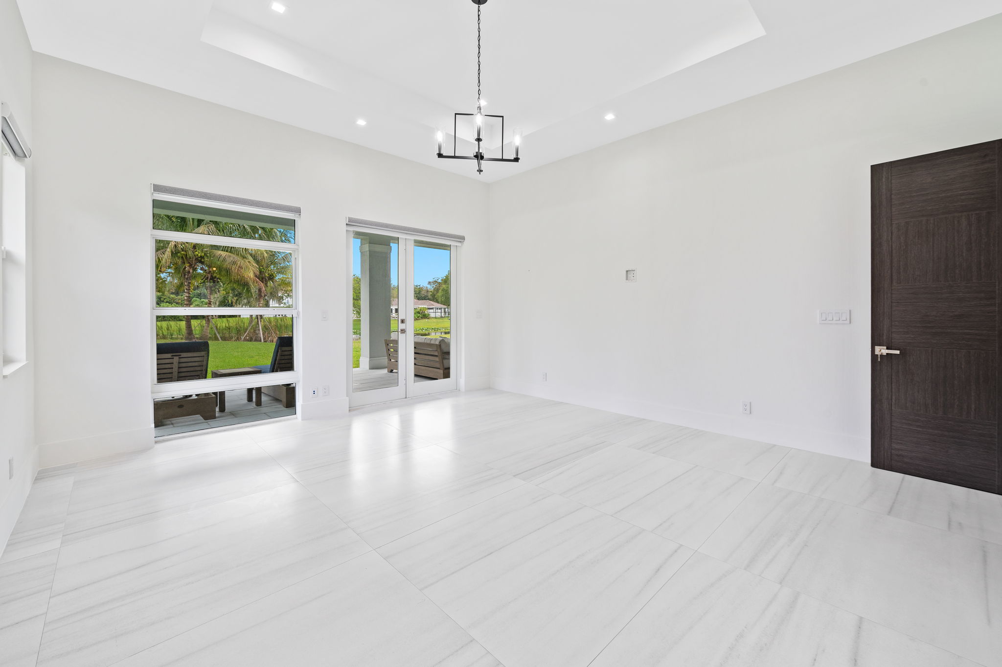 Primary Bedroom opens to the outdoor living area