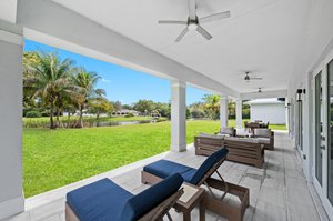 Outdoor Living Area - Covered Marble Tile Patio with 3 Ceiling Fans - Lovely Lake View