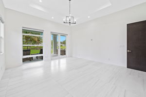 Primary Bedroom opens to the outdoor living area
