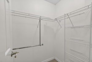 Primary Bedroom First Walk-In Closet