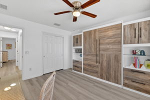 Third Bedroom with Built-In Cabinetry and Queen Murphy Bed