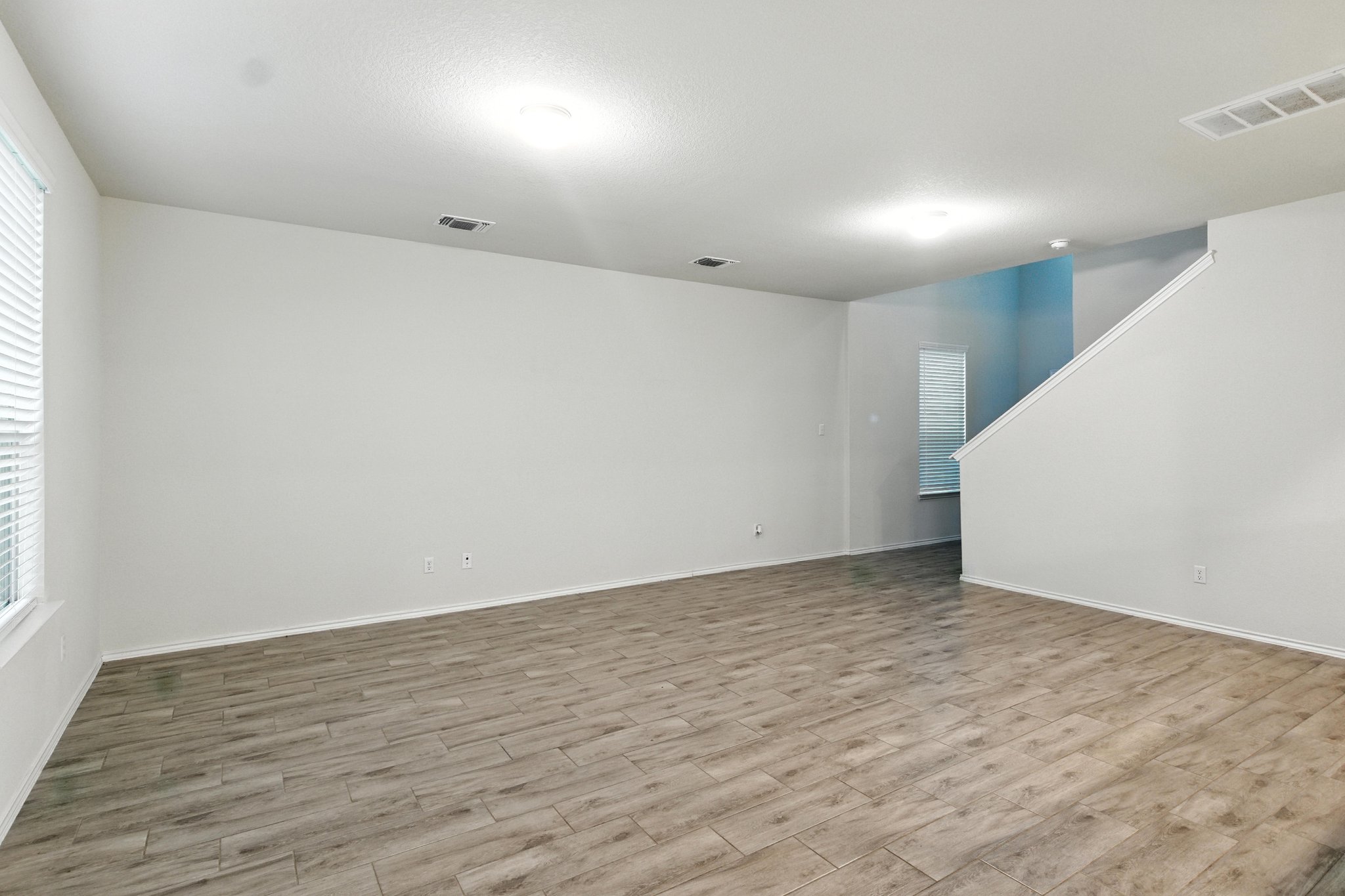 The family room can accommodate large settings.