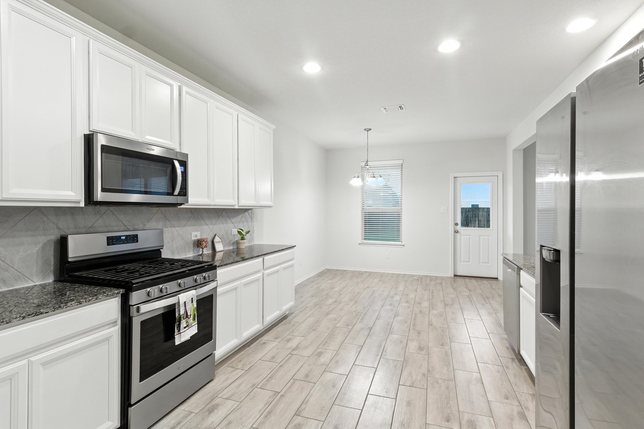 There's plenty of cabinets and counterspace here.