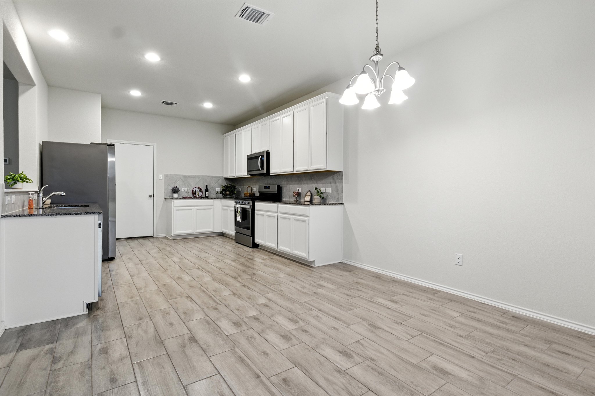 The dining area is open to the large kitchen.