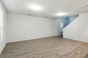 The family room can accommodate large settings.