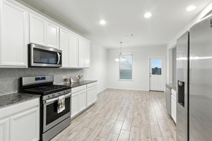 There's plenty of cabinets and counterspace here.