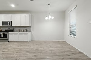 The family room is open to the large dining area.