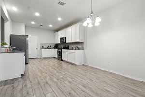 The dining area is open to the large kitchen.