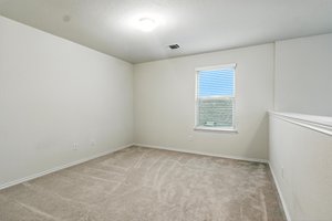 The upstairs gameroom is perfect for work or play.